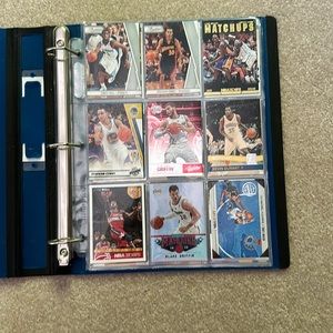 Binder and bag full of NBA cards